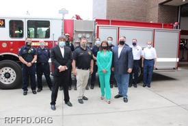 Pictured in front with Congresswoman Newman: 
L-R:  Board Secretary Steve Stratakos, Fire Chief Jeff Ketchen, Congresswoman Marie Newman, Board President Brian A. Bernardoni.