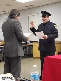 Steve LaRocco is sworn in as Firefighter/Paramedic by Trustee Steve Stratakos at the January 14, 2020 board meeting.  